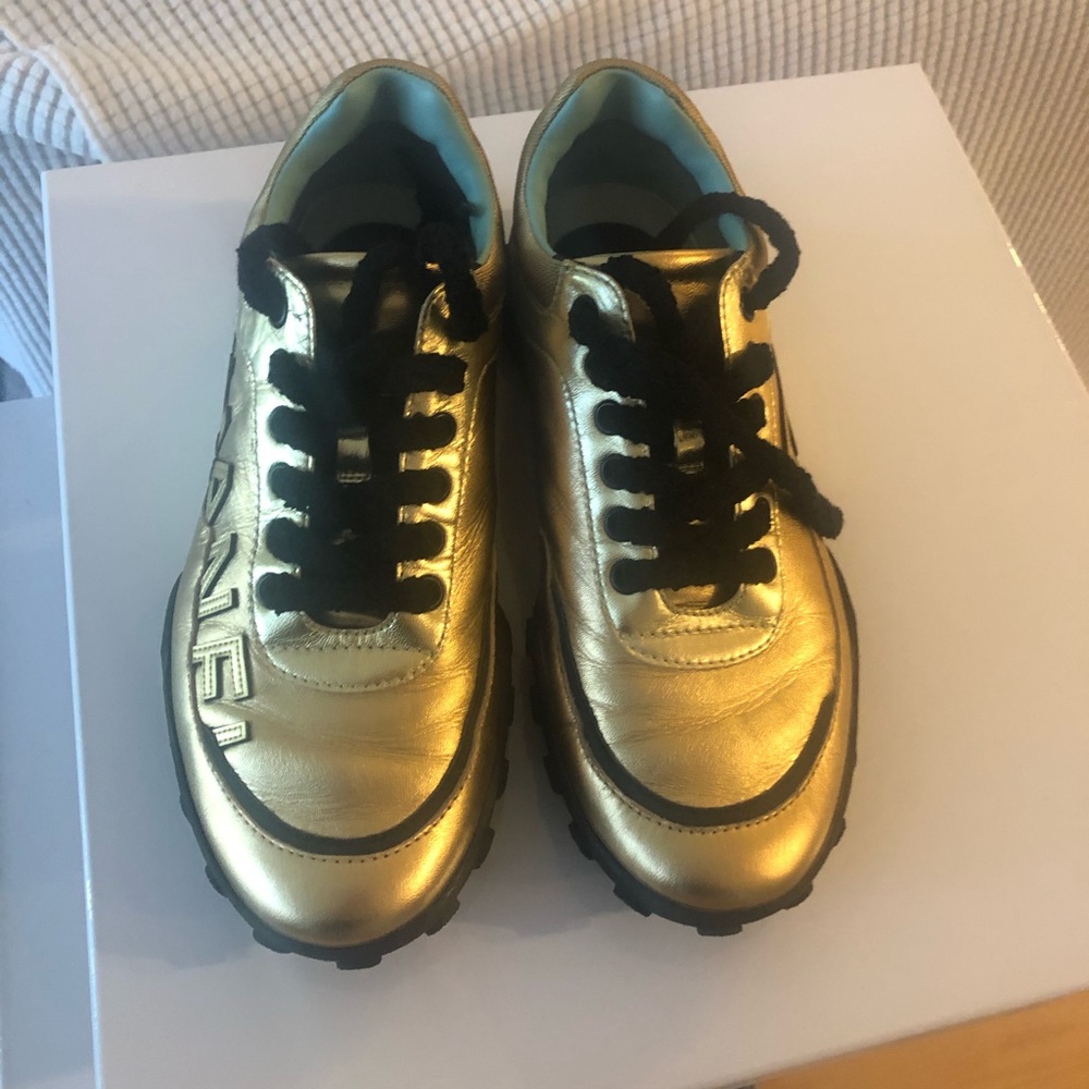 Gold Chanel sneakers